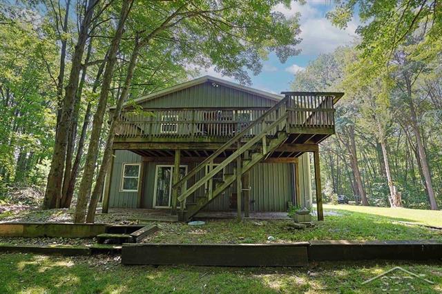 front view picture of 1957 E Nature Lane, Midland, MI. 48640