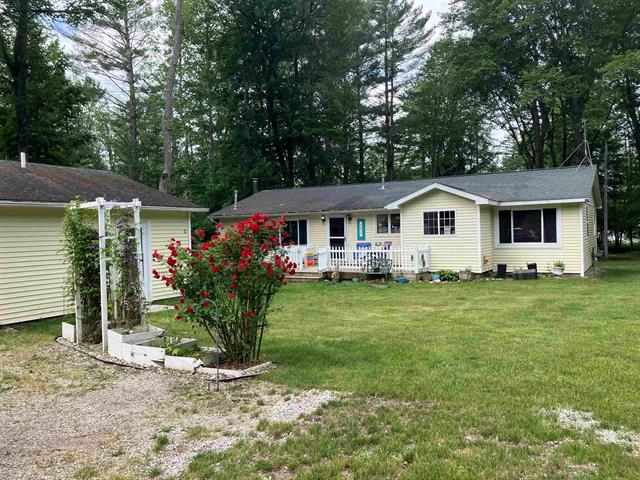 front view picture of 5611 Ne East Shore Drive, Kalkaska, MI. 49646