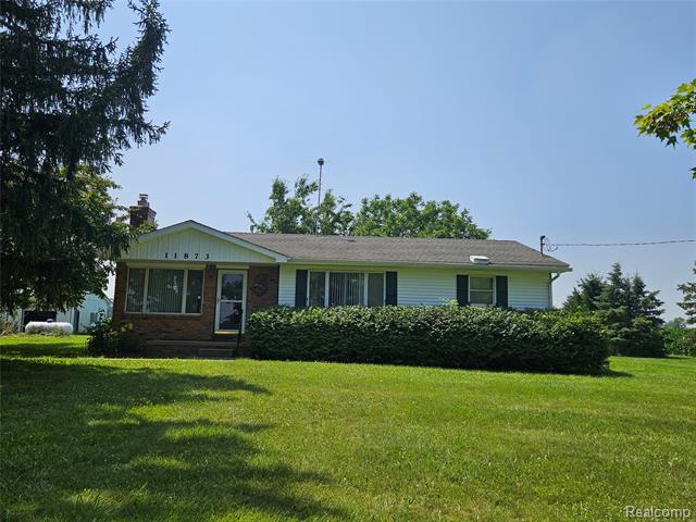 front view picture of 11873 Durand Road, Howell, MI. 48855