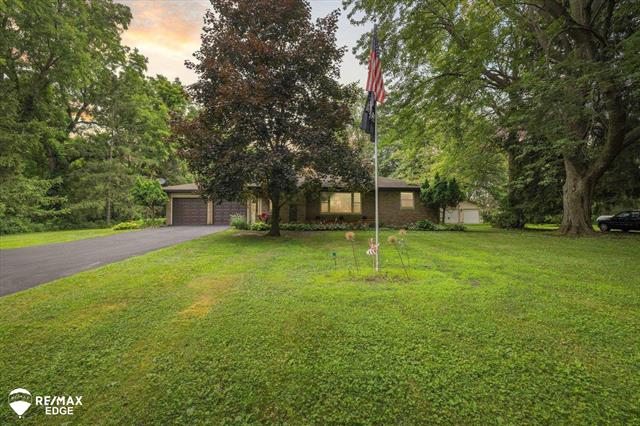 front view picture of 801 Tyrrell Road, Bancroft, MI. 48414