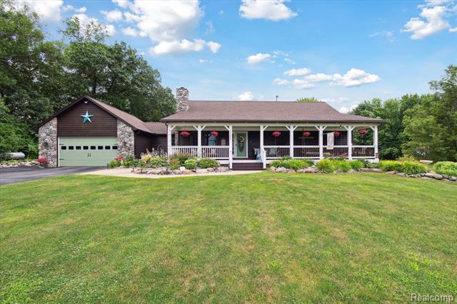 front view picture of 11247 Roberts Road, Stockbridge, MI. 49285