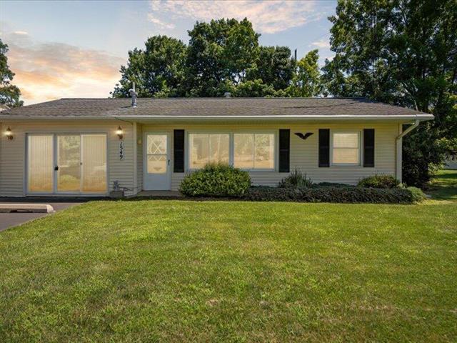front view picture of 1549 Wolf Lake Road, Grass Lake, MI. 49240