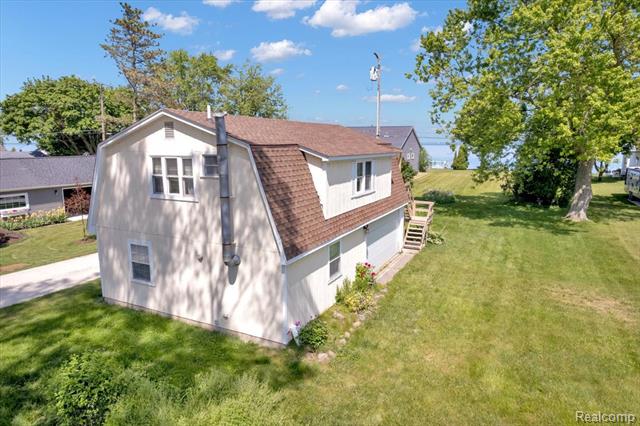 front view picture of 7937 Lakeview Drive, Lexington, MI. 48450
