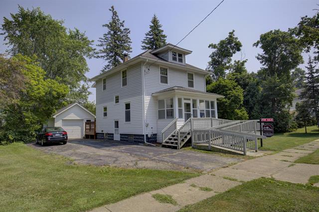 front view picture of 201 N Thompson Street, Jackson, MI. 49202