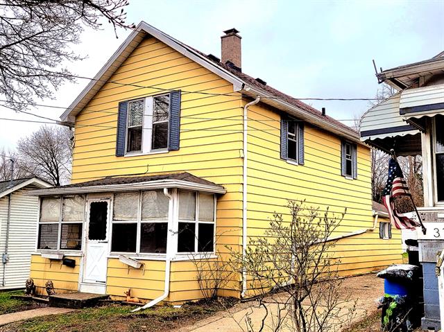 front view picture of 313 Taylor Street, Jackson, MI. 49202