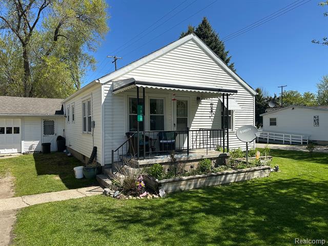 front view picture of 7980 W Gilford Road, Reese, MI. 48757