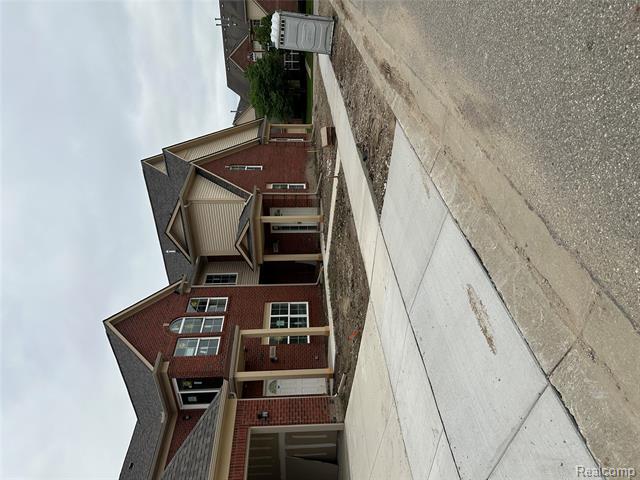 front view picture of 48522 Bridge Way, Canton, MI. 48188