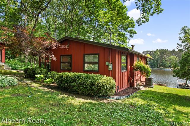 front view picture of 6600 W Shore Drive, Weidman, MI. 48893