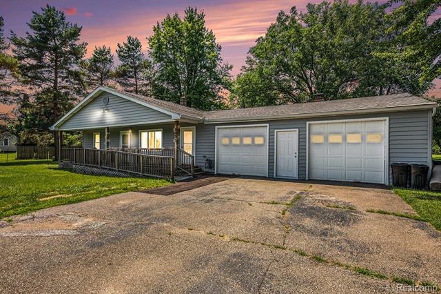 front view picture of 8233 N Genesee Road, Mount Morris, MI. 48458