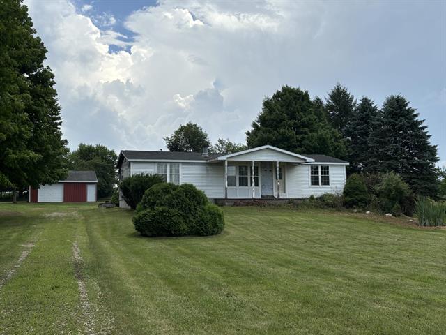 front view picture of 8861 Faye Lake Road, Brooklyn, MI. 49230