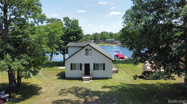 front view picture of 6575 Circle Drive, Harrison, MI. 48625