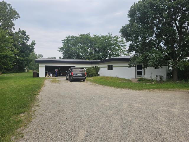 front view picture of 8564 Cooper Road, Rives Junction, MI. 49277