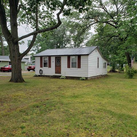 front view picture of 107 Sheridan Drive, Prudenville, MI. 48651