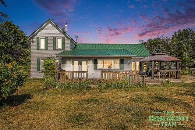 front view picture of 1444 S Moorland Road, Ravenna, MI. 49451