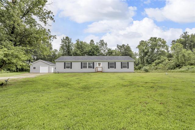 front view picture of 955 Crispell Road, Clarklake, MI. 49234