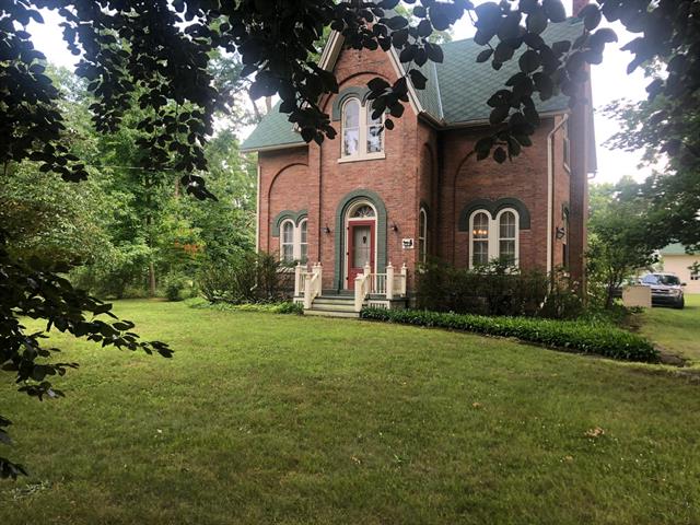 front view picture of 857 E Michigan Avenue, Grass Lake, MI. 49240