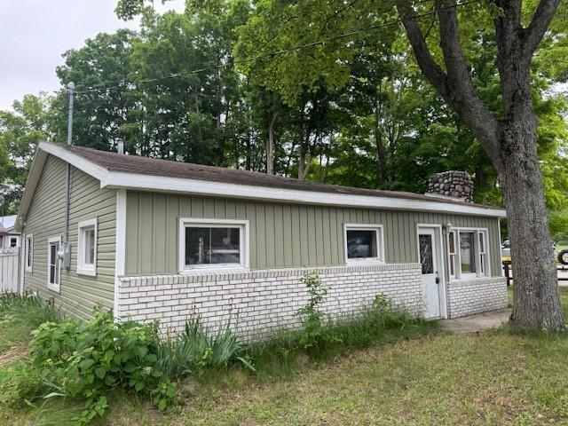front view picture of 13765 Ne Sunburry Road, Kalkaska, MI. 49646