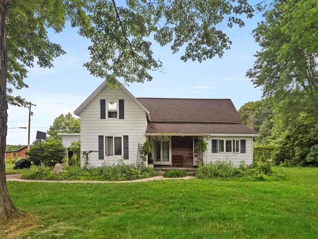front view picture of 9234 Glovers Lake Road, Bear Lake, MI. 49614
