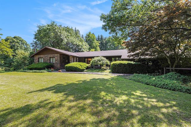 front view picture of 1687 W Willis Road, Saline, MI. 48176