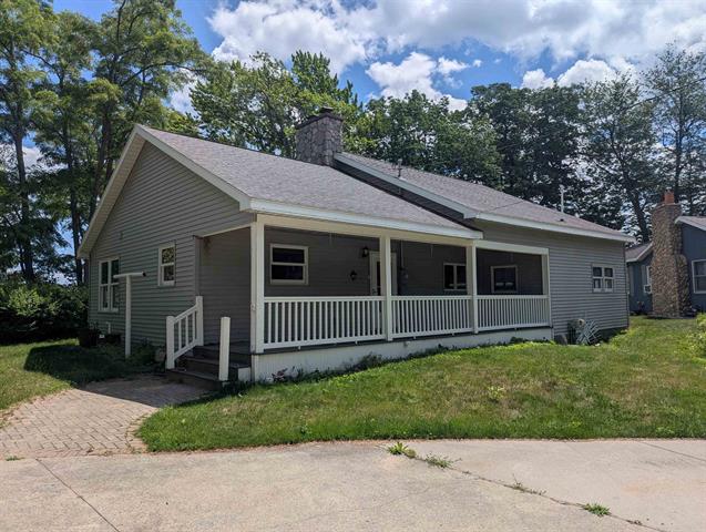 front view picture of 122 N Huron Road, Au Gres, MI. 48703