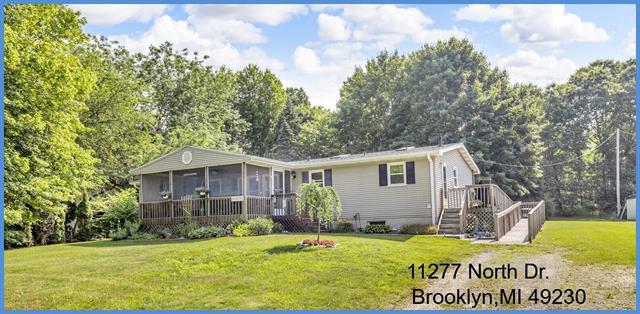 front view picture of 11277 North Drive, Brooklyn, MI. 49230