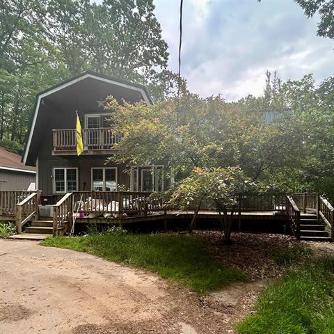 front view picture of 4711 Mockingbird Drive, Farwell, MI. 48622