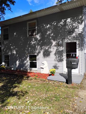 front view picture of 335 Beach Street, Mount Morris, MI. 48458