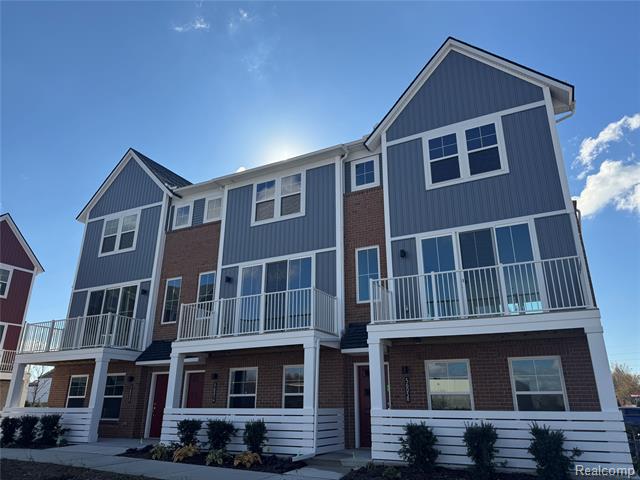 front view picture of 56054 Madison Lane, New Hudson, MI. 48165