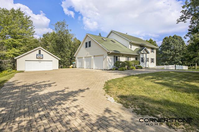 front view picture of 7758 Pine Island Court Ne, Belmont, MI. 49306