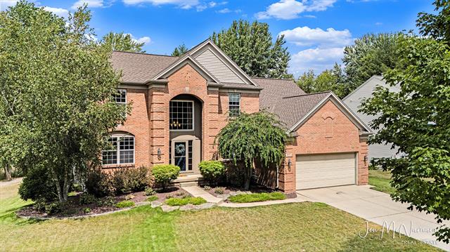 front view picture of 3879 Fraser Drive Ne, Rockford, MI. 49341