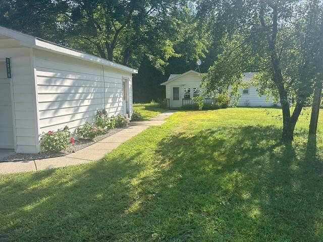 front view picture of 8039 Riley Road, Farwell, MI. 48622