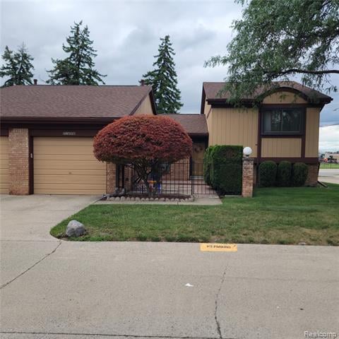 front view picture of 11899 W Caradonna Street, Warren, MI. 48093