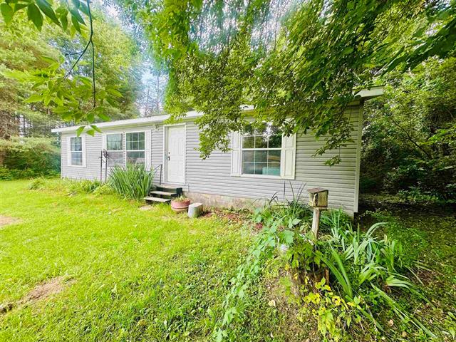 front view picture of 3553 Lee Hill Road, Mayville, MI. 48744