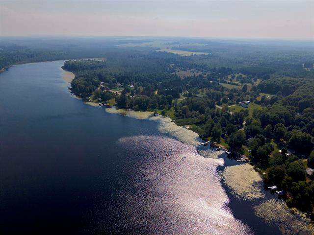 front view picture of 4328 N Shore Drive, Kalkaska, MI. 49646