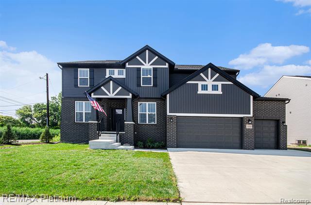 front view picture of 12020 Timber Court, Romeo, MI. 48065