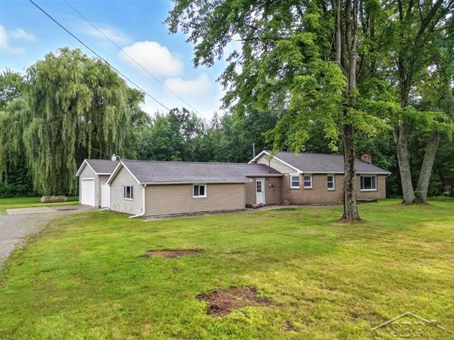 front view picture of 2910 E Baker Road, Midland, MI. 48642