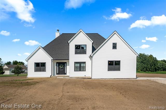 front view picture of 78758 Angling Road, Richmond, MI. 48062