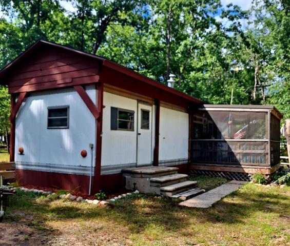 front view picture of 11971 S Red Cedar Avenue, Baldwin, MI. 49304