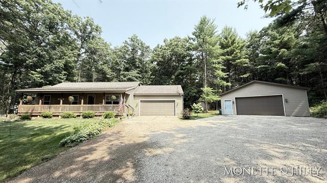 front view picture of 6472 15Th Street, Twin Lake, MI. 49457