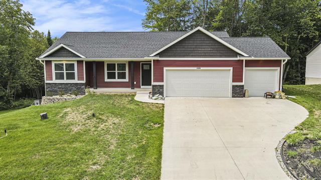 front view picture of 13020 Spruceridge Road, Gowen, MI. 49326