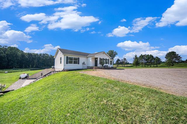 front view picture of 4769 Norvell Road, Grass Lake, MI. 49240