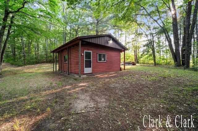 front view picture of 7278 E 6 Mile Road, Luther, MI. 49656