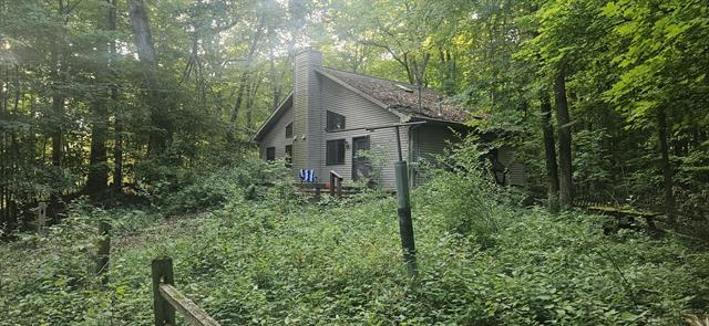 front view picture of 11720 Wamplers Lake Road, Brooklyn, MI. 49230