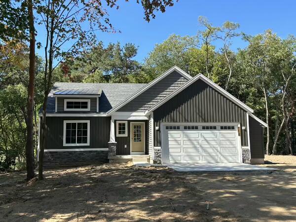 front view picture of 7215 Chandler Drive Ne, Belmont, MI. 49306