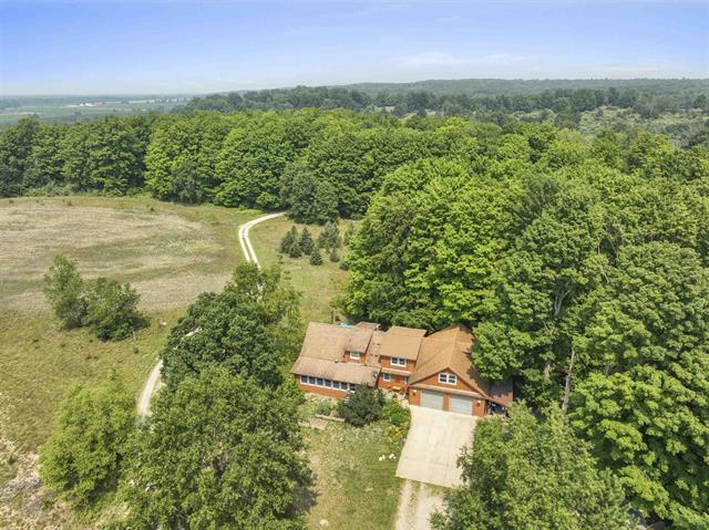front view picture of 4353 E 6 Mile Road, Luther, MI. 49656