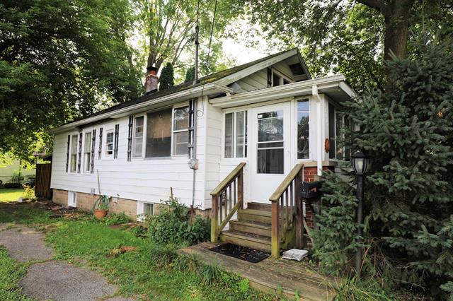 front view picture of 11614 Temperance Street, Mount Morris, MI. 48458