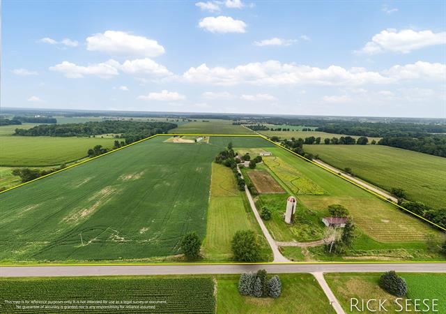 front view picture of 2094 W Peck Lake Road, Ionia, MI. 48846