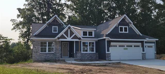front view picture of 1460 Kimber Drive, Lowell, MI. 49331