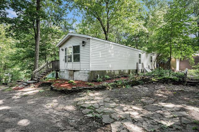front view picture of 15740 Grey Goose Drive, Gowen, MI. 49326