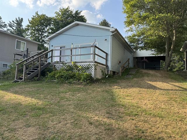 front view picture of 8871 Lakeview Boulevard, Rodney, MI. 49342